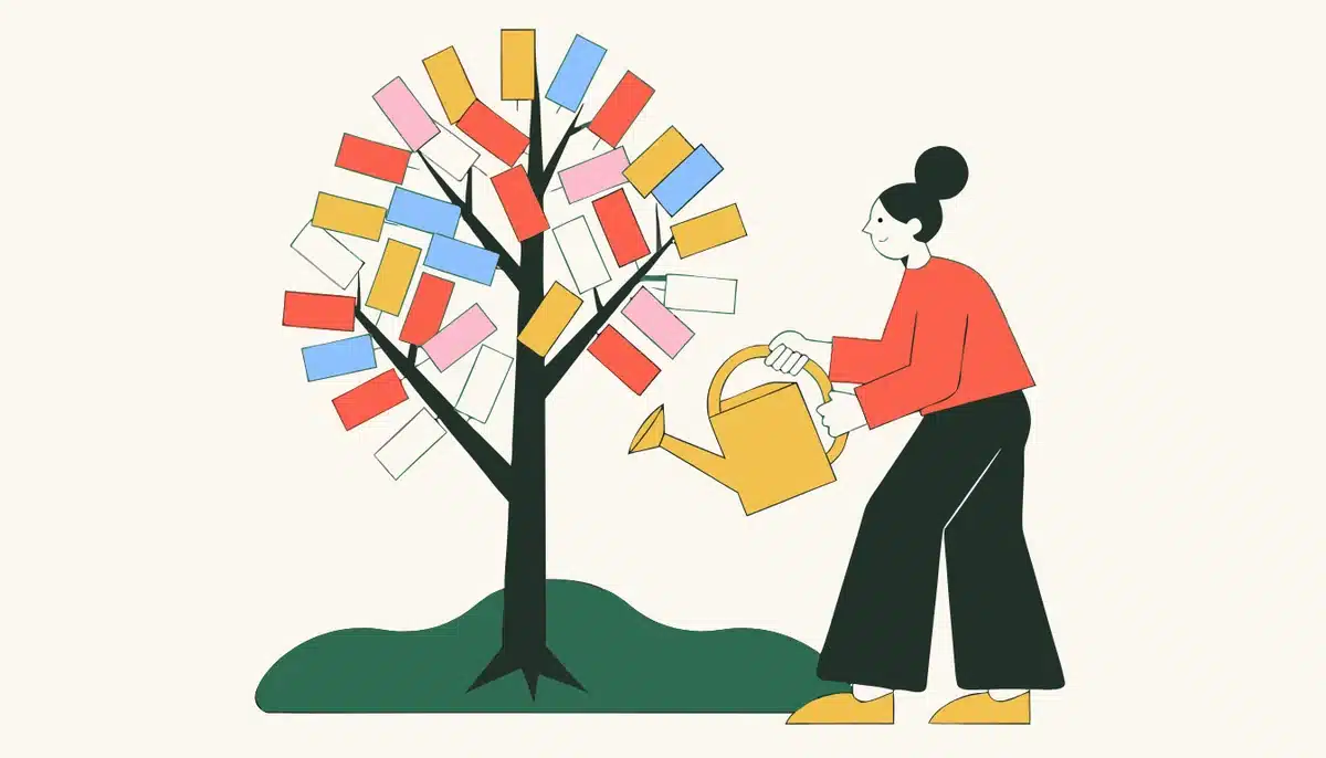 Effektives Vokabeltraining: Nachhaltiger Wortschatz 1 Illustration: Eine Person gießt einen Baum, dessen Blätter bunte Karteikarten sind.